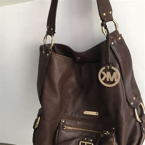 bolsa michael kors replica marrom|Michael Kors serial number lookup.